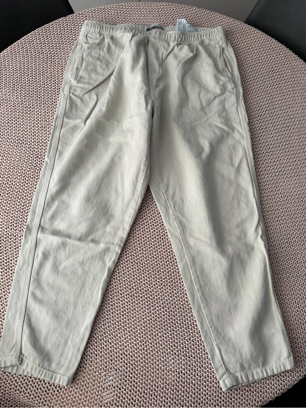 Zara Men's relaxed-fit elastic waistband trousers in a light beige/sand colorway